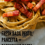a plate of fresh pasta sauce with pesto and pancetta
