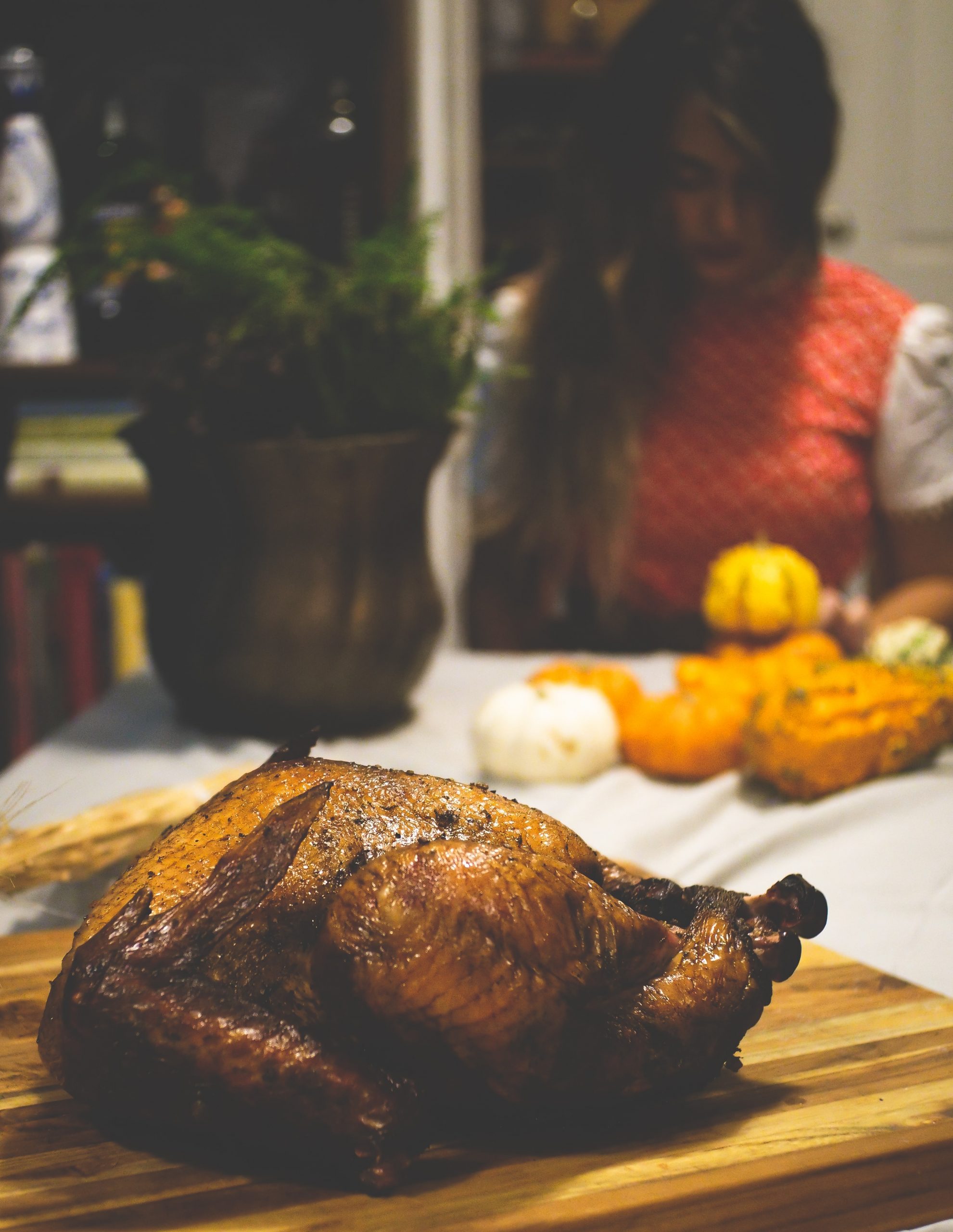 smoked turkey on table with fall decor