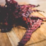 a pile of homemade smoked beef jerky