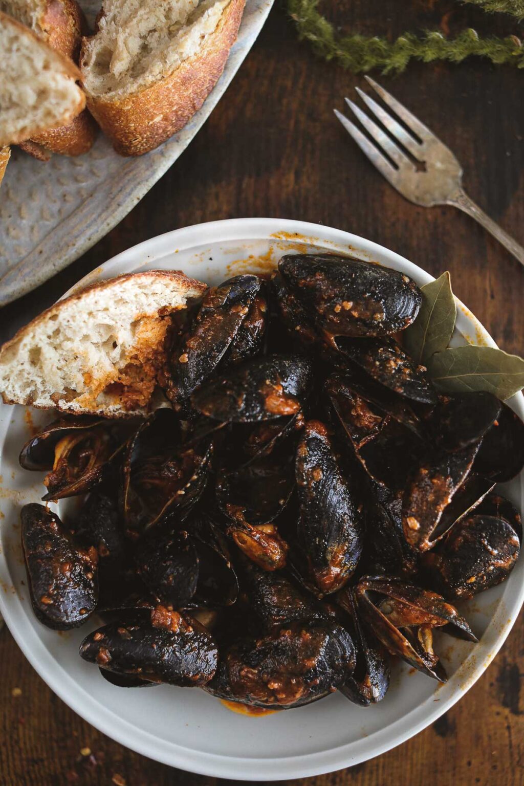 Garlicky Mussels In a Red Wine Tomato Sauce With Pancetta