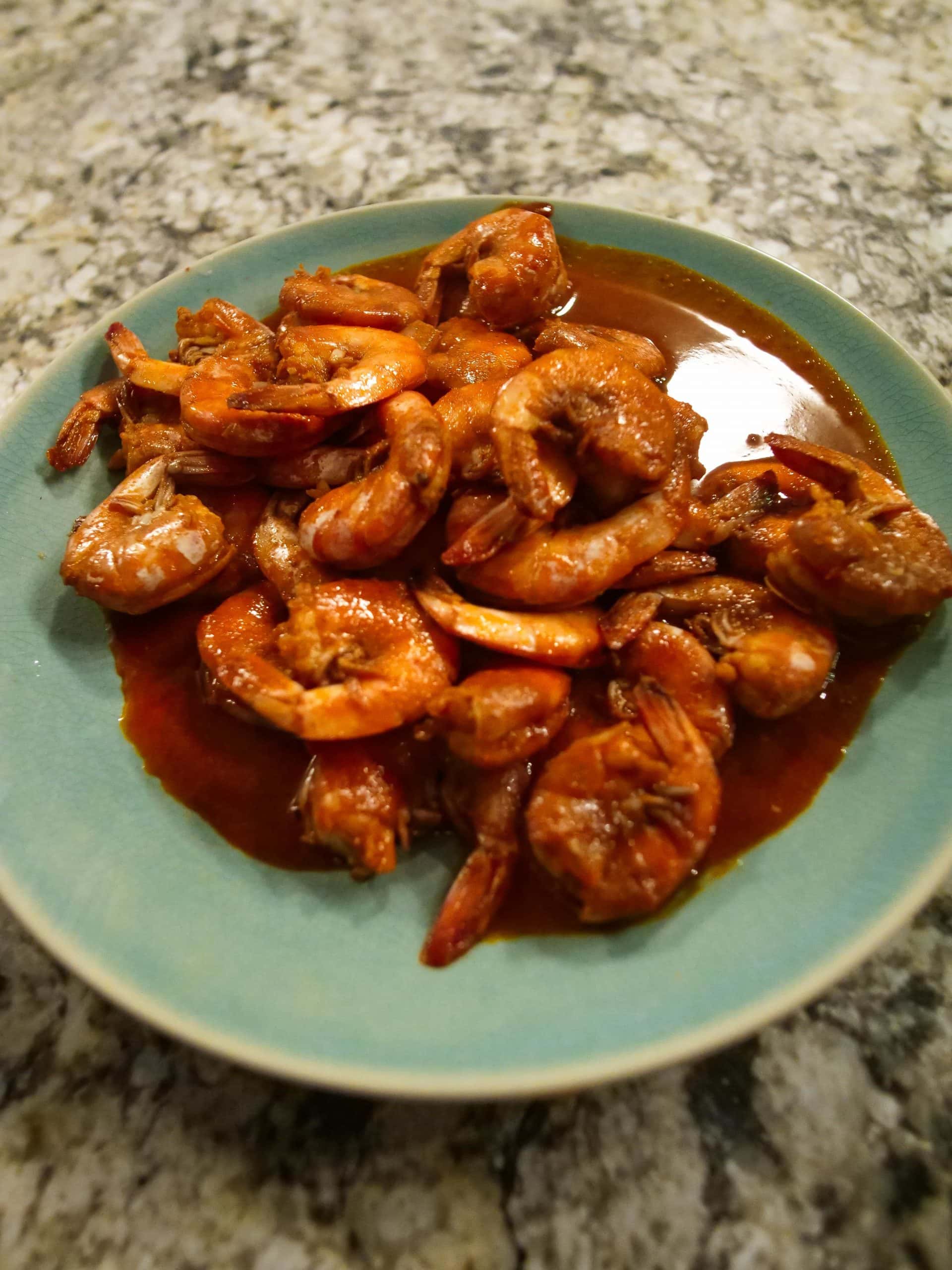 plate of shrimp in sauce