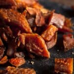 smoked salmon jerky on dark grey granite board