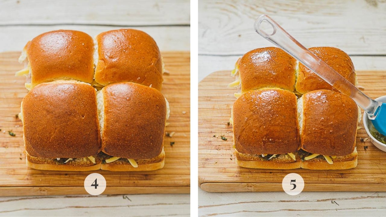 Buns being brushed with butter mixed with herbs.