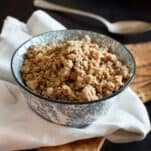A bowl full of cooked, boiled ground beef.