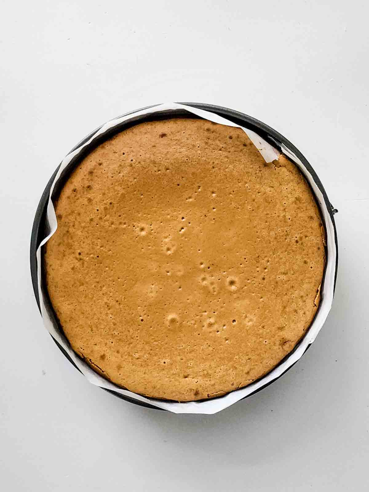 What the baked gingerbread cheesecake looks like fresh out of the oven.