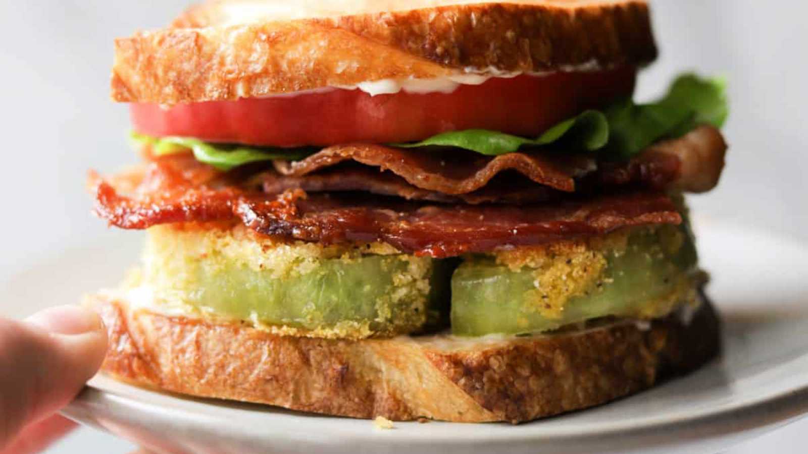A BLT or bacon, lettuce, and tomato sandwich made with fried green tomatoes.