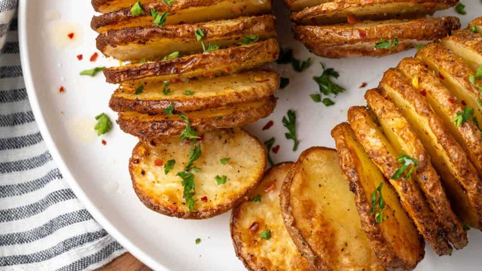 Thinly slice potato in plate.