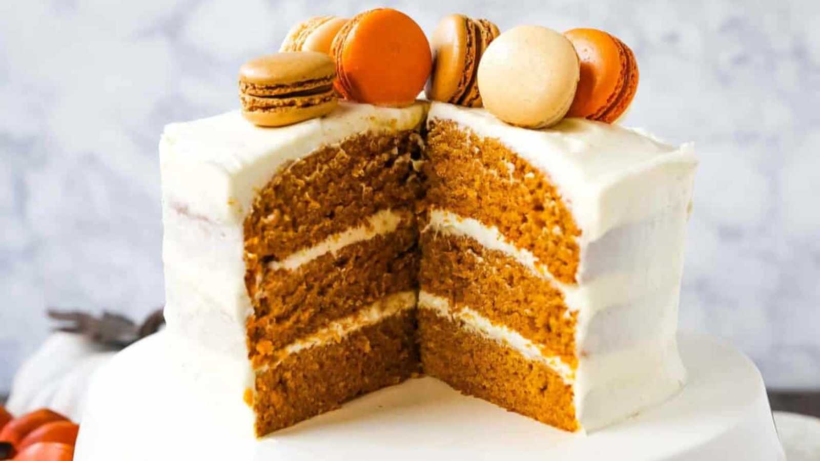 A pumpkin layered cake with cream cheese frosting moist pumpkin spiced cake with a sweet cream cheese frosting.