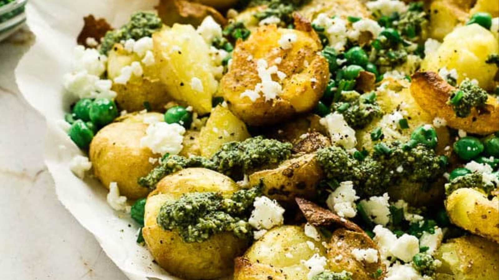 Roasted smashed potatoes with sweet and vibrant peas.