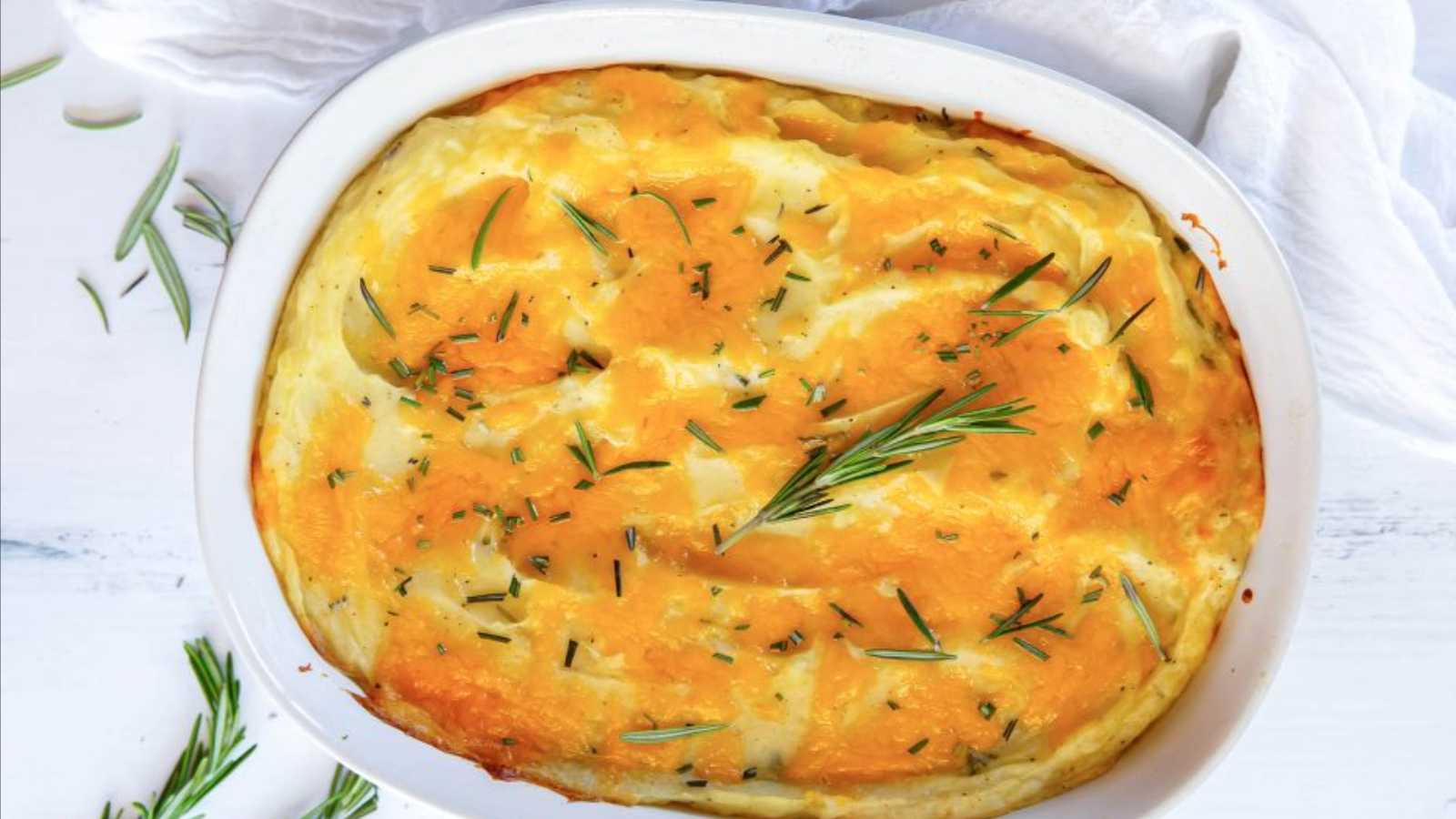 Baked mashed potatoes in plate.