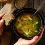 A bowl of chicken noodle soup.