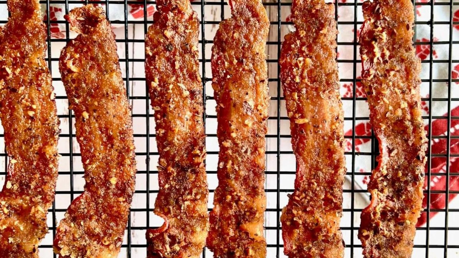 This Million Dollar Bacon is baked in the oven with brown sugar and spices to make crispy candied bacon that tastes like a million dollars!