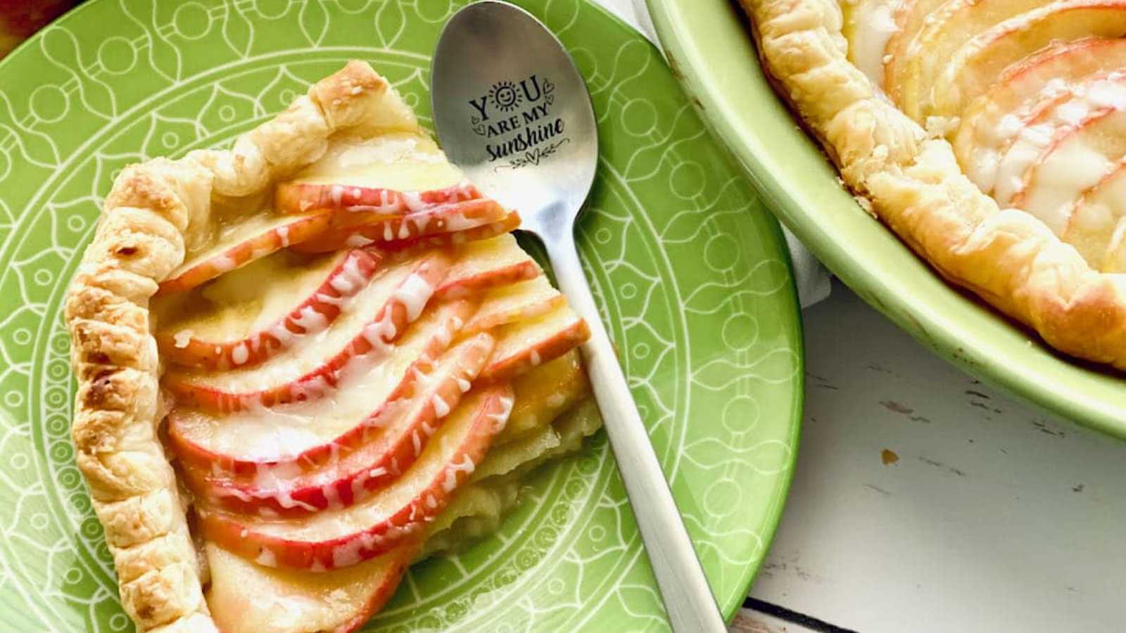 Apple pie puff pastry has been made with honeycrisp apple slices topped with lemon curd icing for an easy fall dessert.