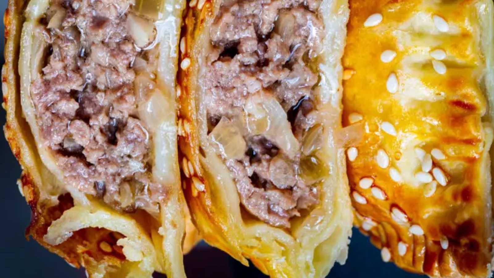 Mouthwatering stuffed pastry bursting with flavorful meat.