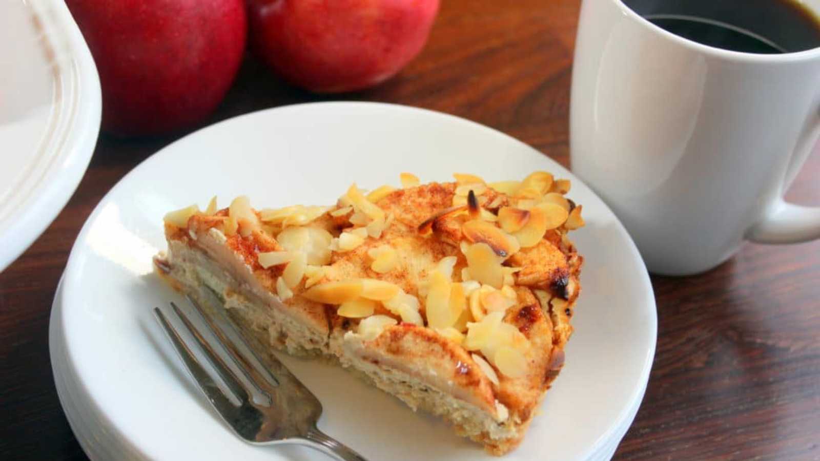 Almond and apple tarts have a rich shortbread base, creamy cream cheese filling, and tart cinnamon apples.