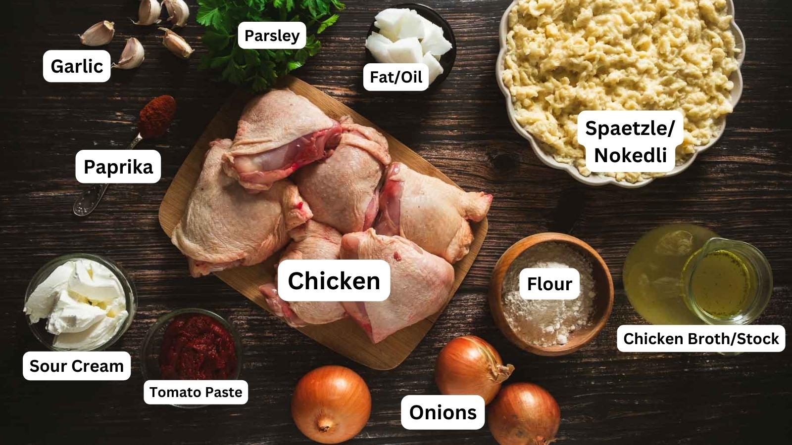 All of the ingredients needed to make authentic Hungarian chicken paprikash.