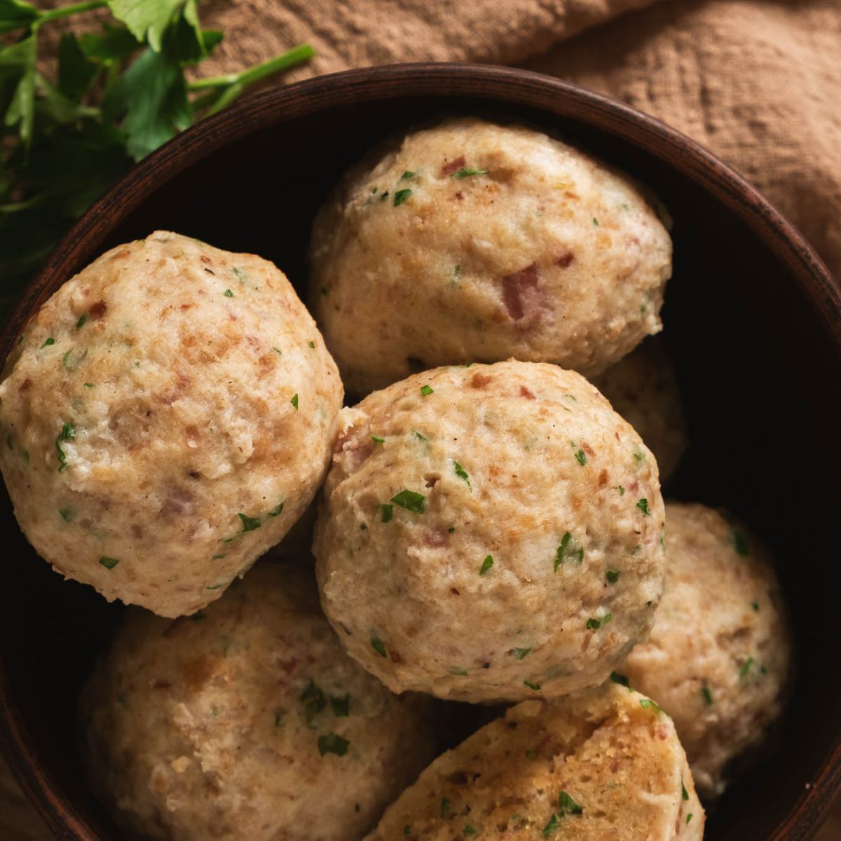 German bread dumplings or semmelknodel in a bowl.