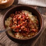 A bowl of strapačky, halušky with sauerkraut and bacon.