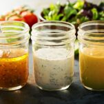 Mason jars with homemade salad dressings.