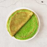 The finished, stacked spinach crepes.