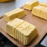 Homemade butter with stamped design.