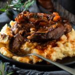 Saucy lamb shoulder chop.