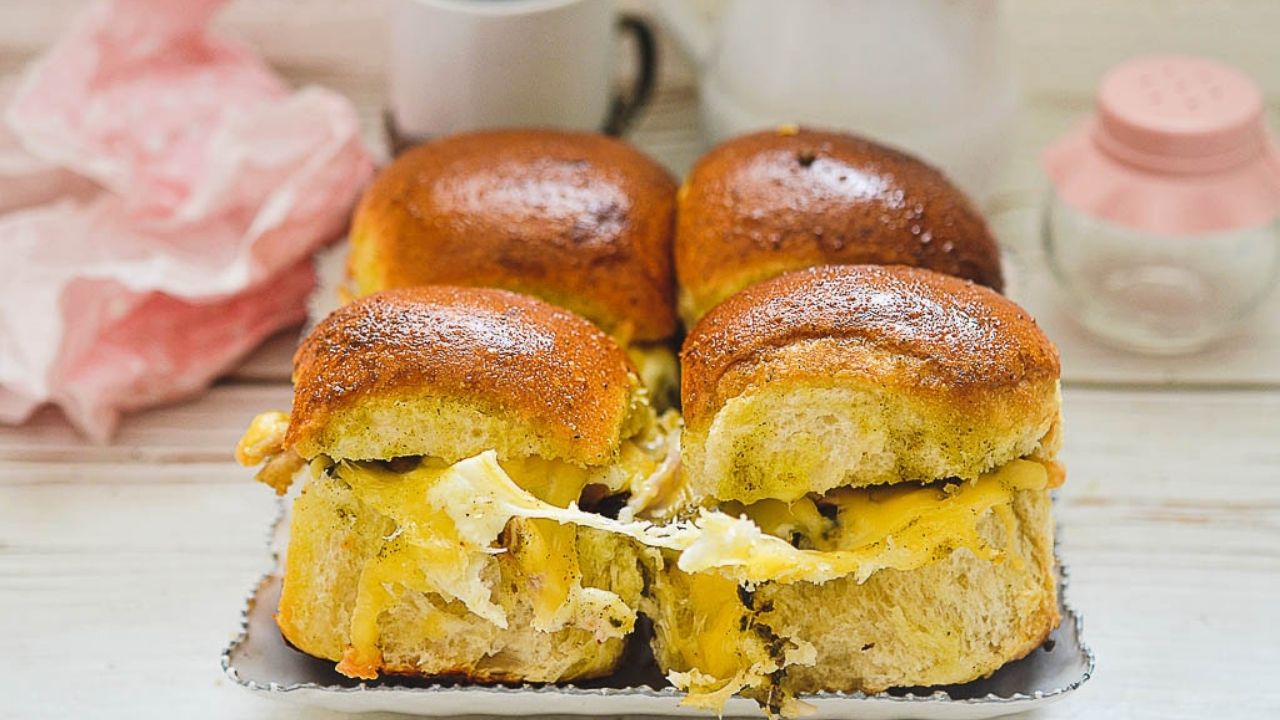 A platter of turkey pesto sliders.