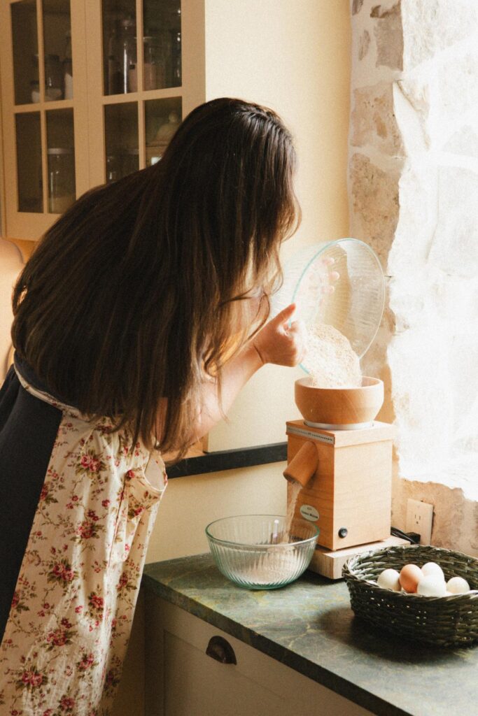 Milling wheat berries into freshly milled flour.