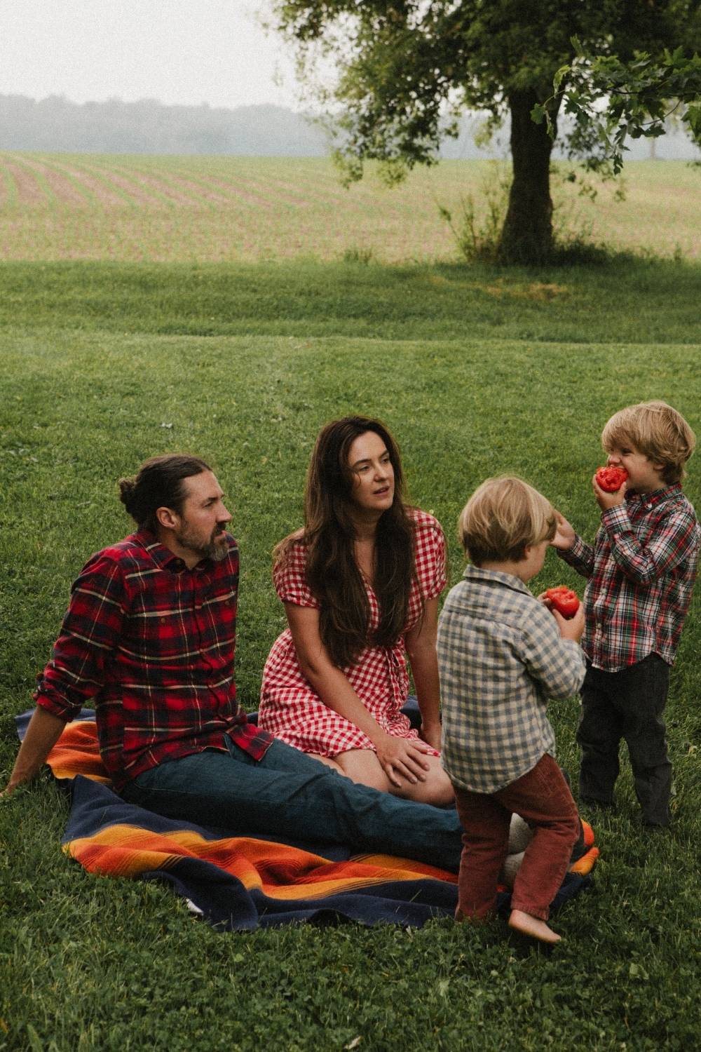 With my husband and children on our homestead.