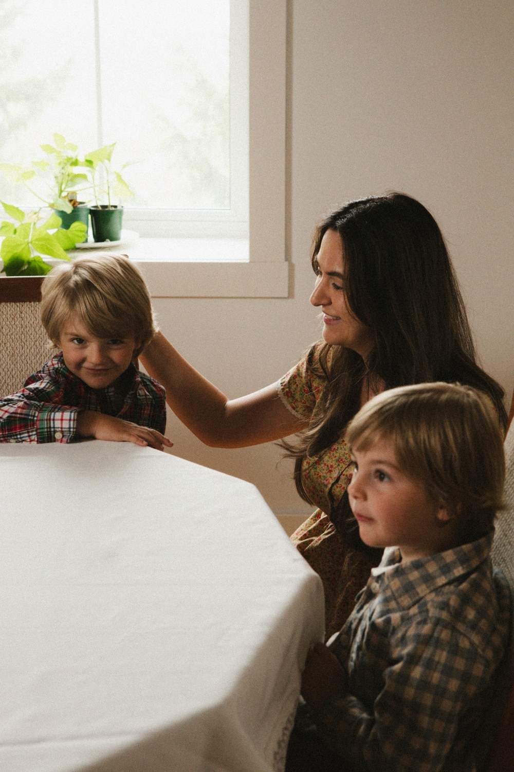 Me with my two sons at the dining room table.